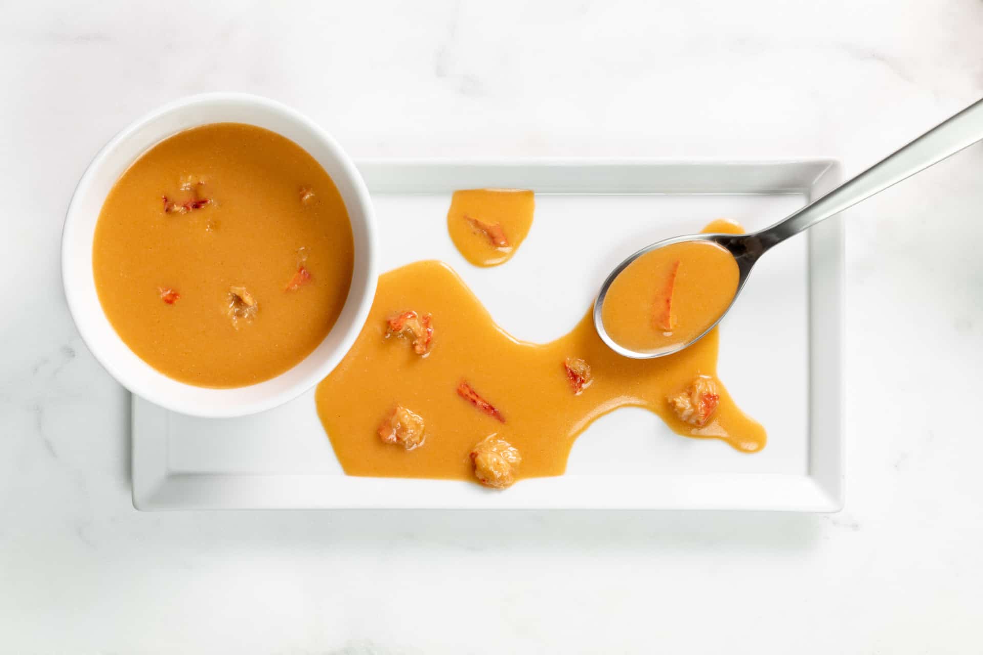 lobster sauce with bowl and plate
