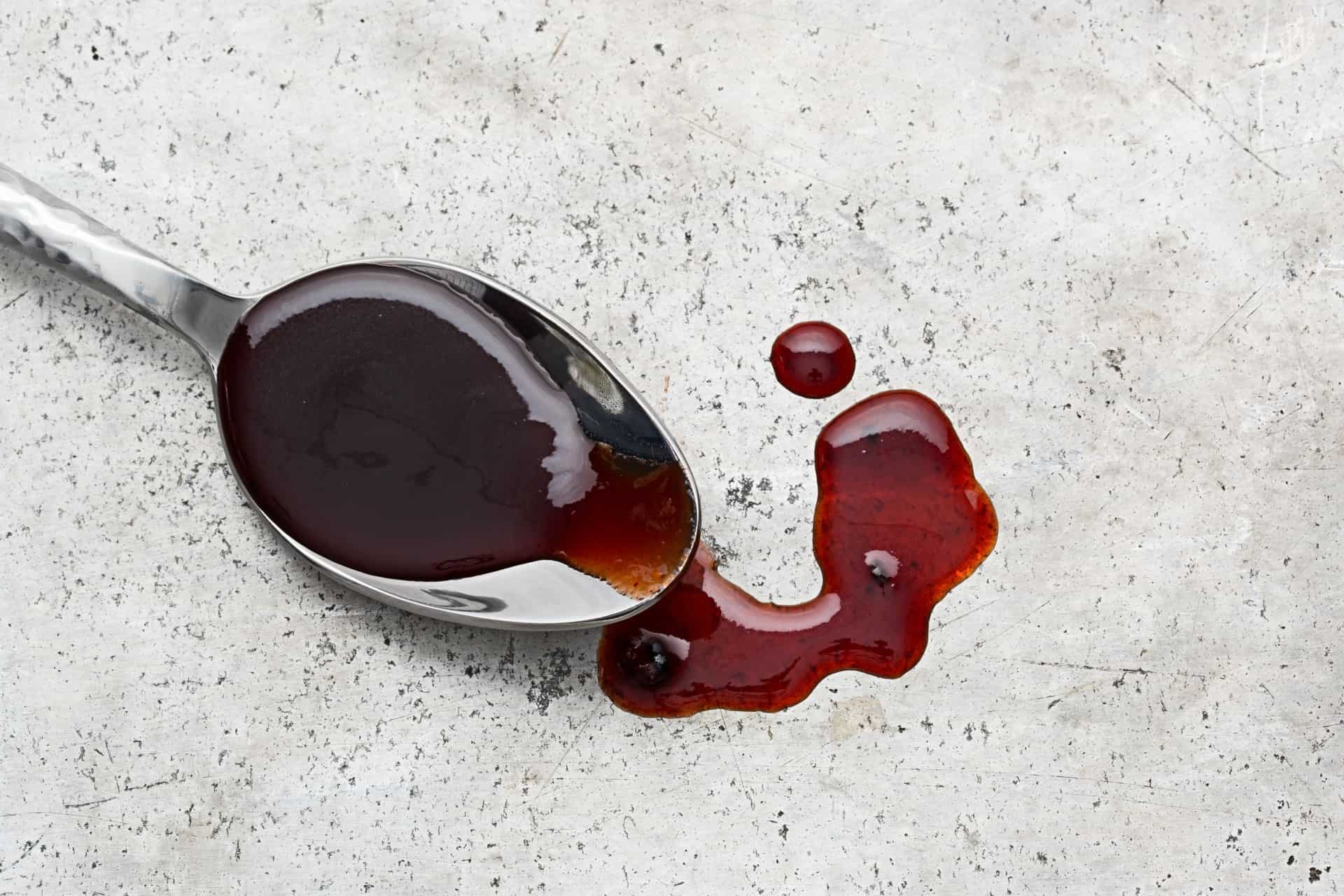 port wine sauce on spoon